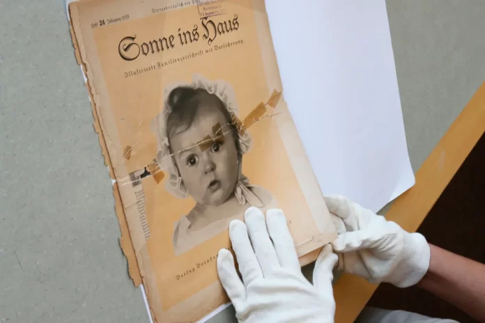 Hessy Levinsons Taft y la portada con su foto infantil usada por la propaganda nazi